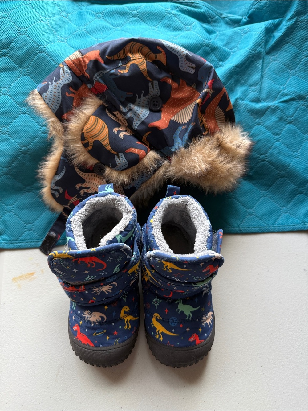 Unbranded Navy Kids Dinosaur Snow Boots with Cozy Fleece, matching winter hat.
